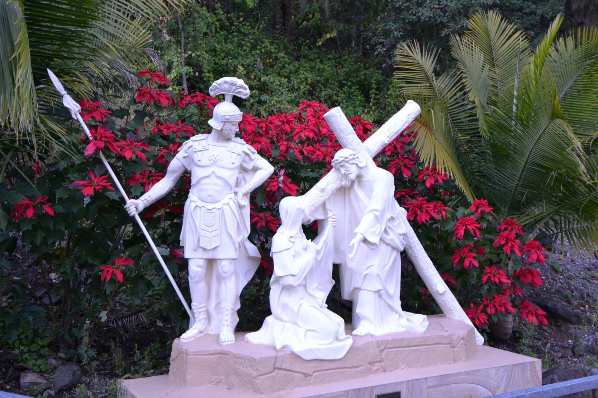 Sixth Station: Veronica wipes the face of Jesus. One of the life sized Stations of the Cross.